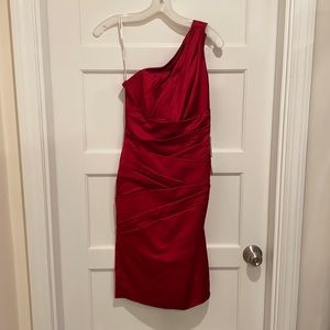 Ruby red. Never worn.